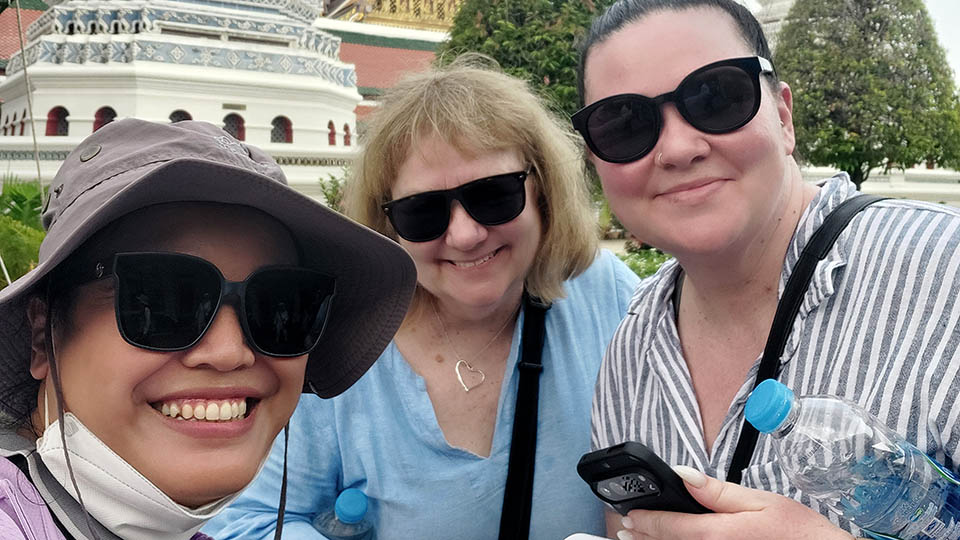 Ashley S. with Bangkok tour guide Apple visiting the Grand Palace in Thailand