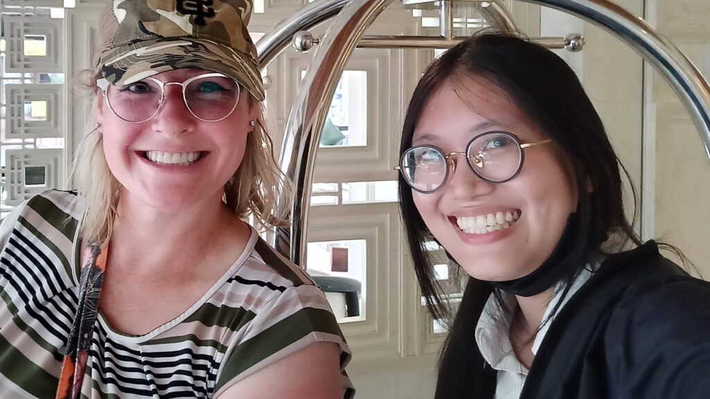 Dena M. with Bangkok tour guide Ticha during a private city tour in Thailand