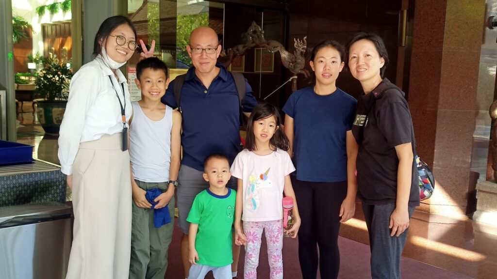 May C. and family with Bangkok tour guide Ticha during a private tour in Bangkok, Thailand