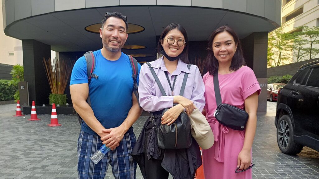 Michelle C. with Bangkok tour guide Ticha outside their hotel before a private city tour